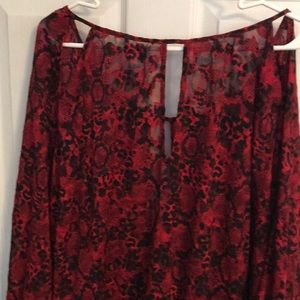 Red and black sheer blouse with slits